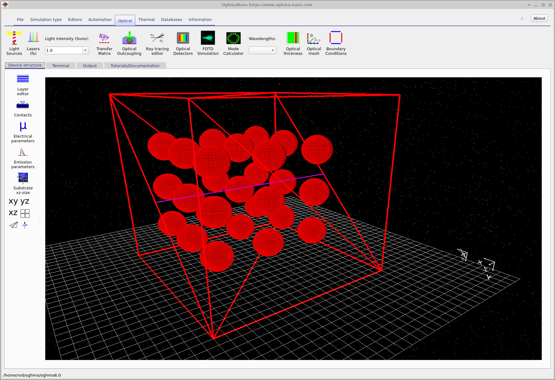 OghmaNano 3D simulation window showing a hexagonal array of red spheres arranged in a close-packed hexagonal pattern, viewed from above and to the side.