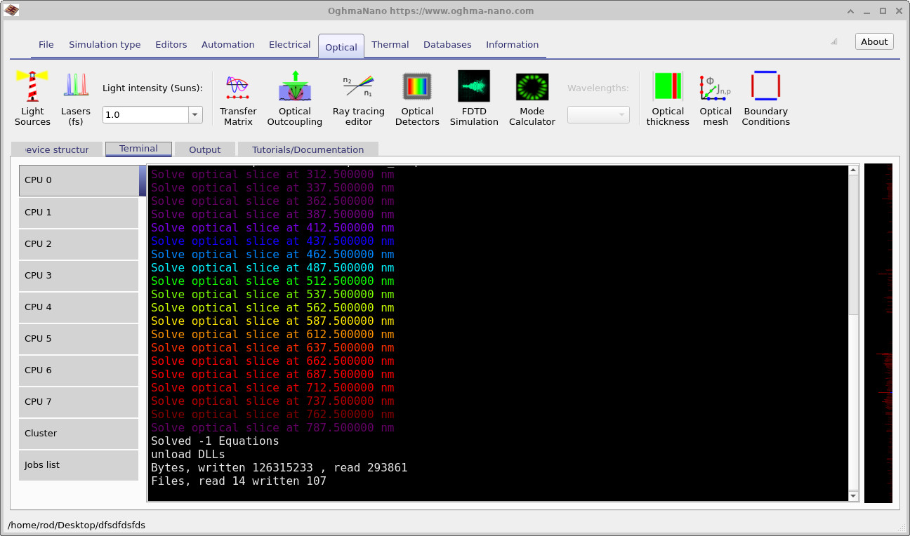 Terminal showing the transfer matrix method solving each optical slice at a series of wavelengths from about 312.5 nm to 787.5 nm, with colour-coded output.