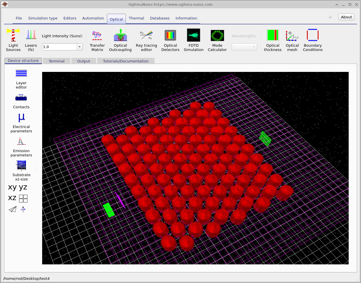 Device view of the photonic crystal after increasing the pillar radius to 150 nm, showing visibly fatter pillars.