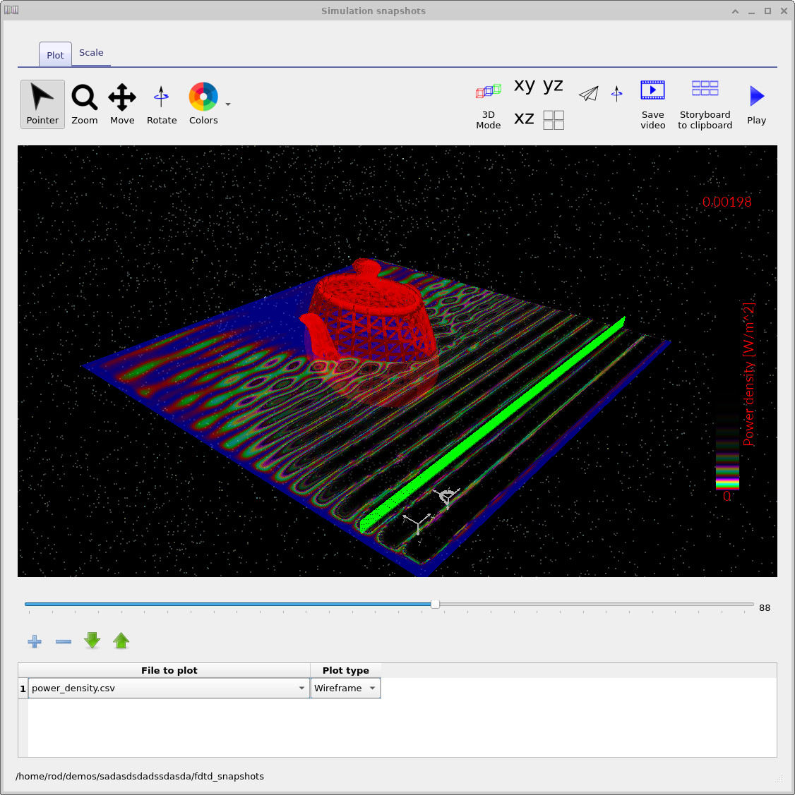 Power-density snapshot showing microwave interaction with the teapot and interference bands around it